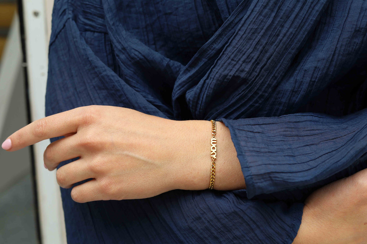 armband met tekst (magic, happy, lucky)
