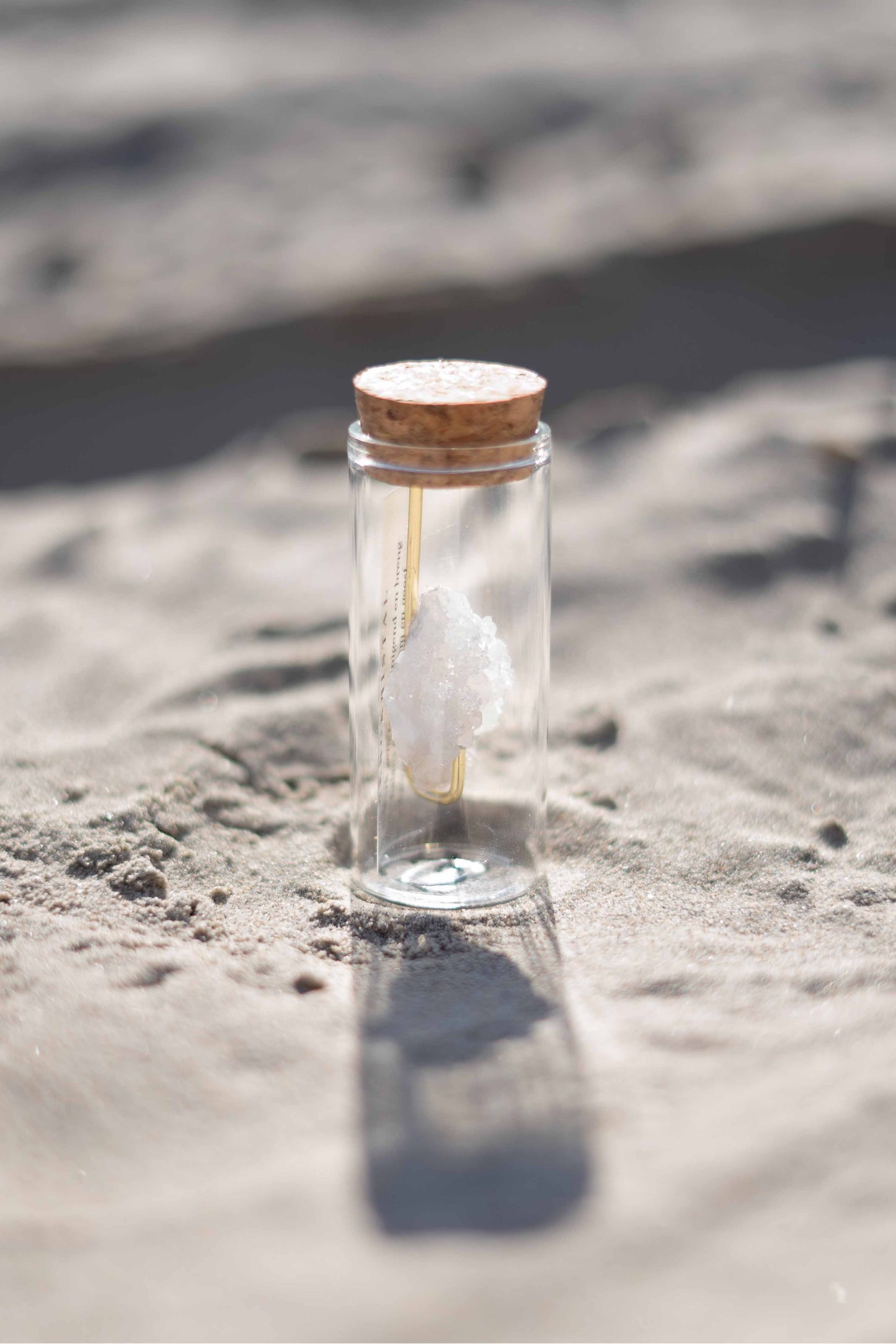 Bottle of gemstone - rock crystal